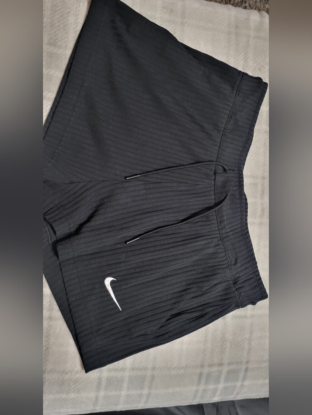 Nike Women’s Black Ribbed Athletic Shorts with White Swoosh And Pockets Medium